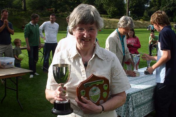 prizes 9.jpg - Janet Coley with a cup and a trophy for her photographs